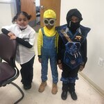 3 students in costumes